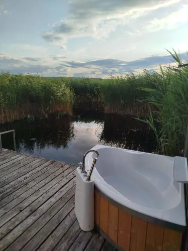 Pfahlbau Sunset I Toplage Elektroboot inklusive