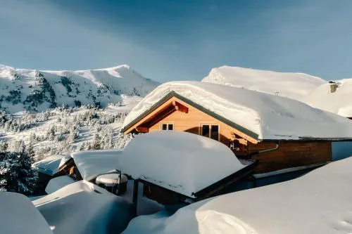 Heidi Chalets Falkertsee - Luxuschalet Bergwinter