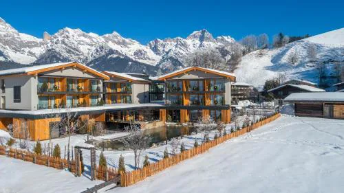 Wellness und Brunch Hotel MorgenZeit beheizter Naturteich Genuss Frühstück bis 13 Uhr Hochkönig Sommercard