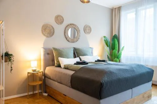 Boho Living Apartments - Historic City Center with Free Parking by HERO HOMES
