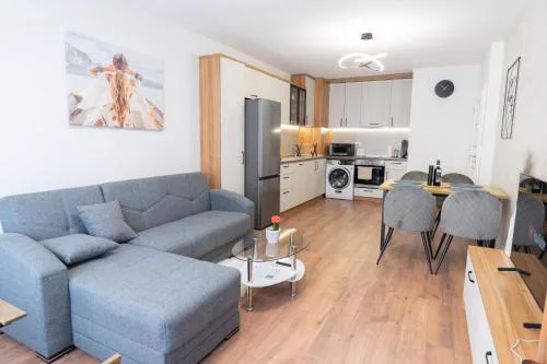New Modern & Cozy apartment with FREE Private parking and EV charging station