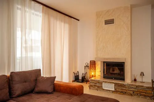 Holiday home with indoor fireplace