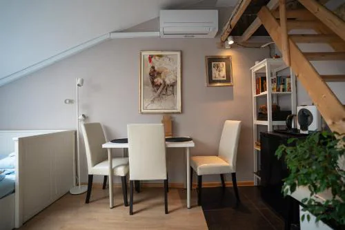 Cosy, workplace studio with a sunny rooftop view