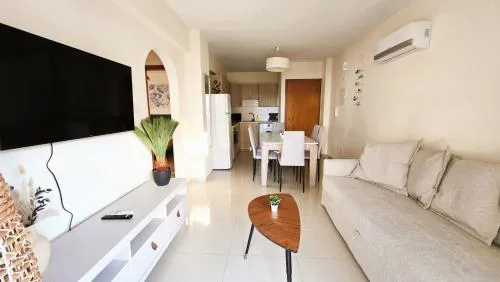 Sunny 2BR Getaway Steps from the Beach with Wi-Fi