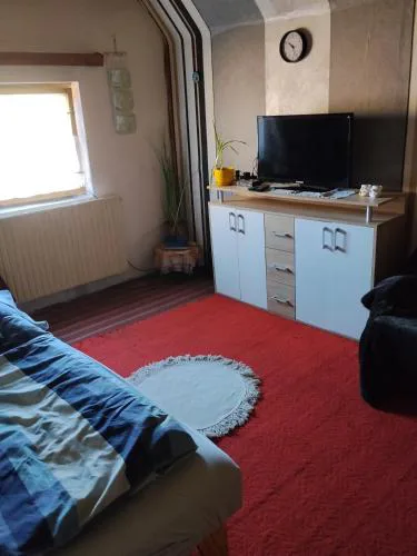 Pokoj s balkónem v rodinném domě
