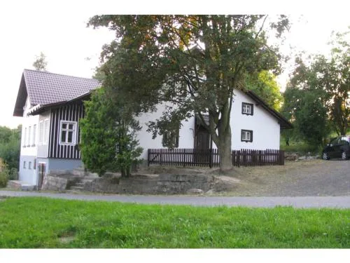 Holiday home in a quiet, authentic mountain village with a view of the surrounding hills