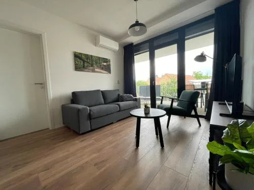 New quiet apartment with a large terrace and private parking