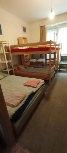 Bed in shared dormitory near the city centre