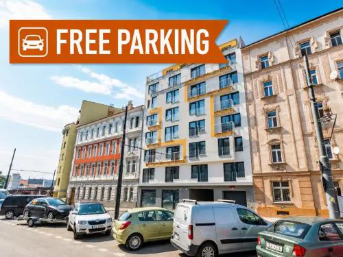Brand new studio apartment #71 with free secure parking in the center