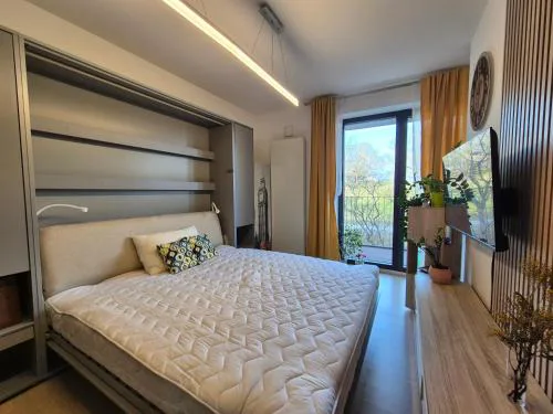 Elegant City Apartment with Balcony near Center