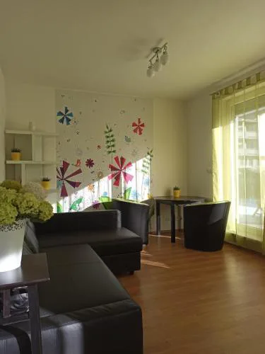 Spacious apartment with garden and private parking
