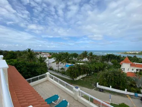 2 BR & 1WR Suite at Villa Costa Verde near Playa Cofresi, Puerto Plata with a pool, balcony, and a rooftop terrace
