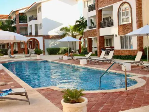 PASSION DEL CARIBE - CORAL VILLAGE 1 - modern and fully equipped apartments & suites in residence with pool and 24 hour security, close the beach, shops, bars, restaurants & entertainment