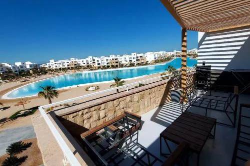 Modern chalet at el gouna Swan Lake compound with Swimable lagoon view