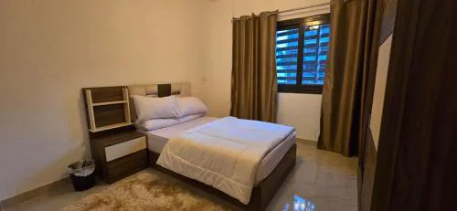 شقة فندقية عصرية بأجواء مريحة وتجربة استثنائية في مدينتي A stylish apartment for a unique and comfortable stay in madina
