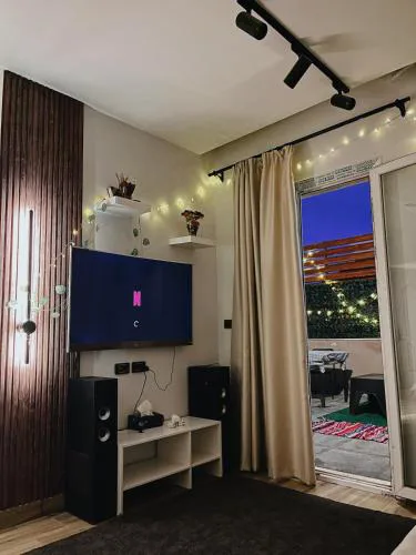Cozy apartment with spacious rooftop in compound