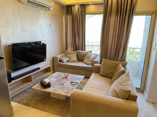 شقة فندقية بالزمالك خلف فندق ام كلثوم اطلالة جانبية على النيل