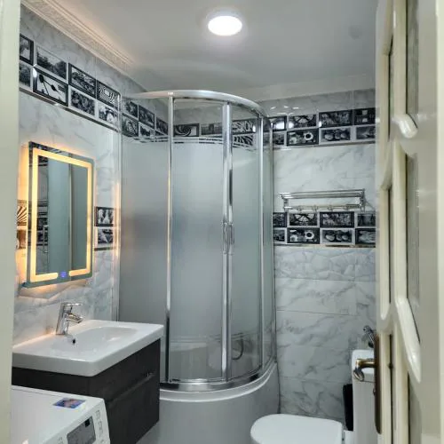 Modern Apartment in Sheraton Heliopolis, 5 minutes from Cairo Airport عمارة مطعم دجاج كنساس