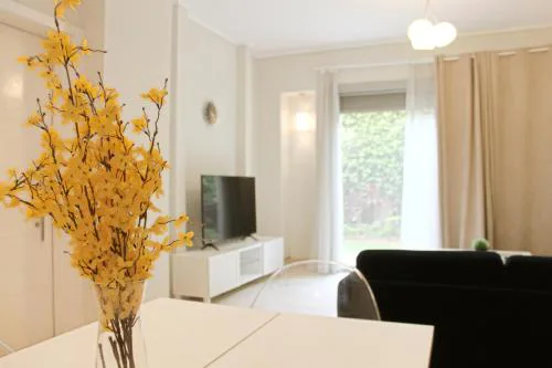 Private Garden 1BR Apt in Palm Hills AUC New Cairo