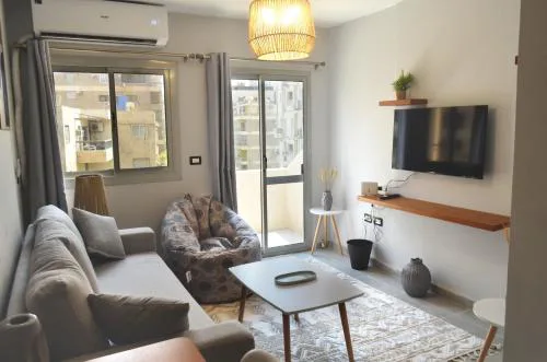 Sunny Oasis 1BR Apartment near Cairo Airport - A Luxurious Retreat