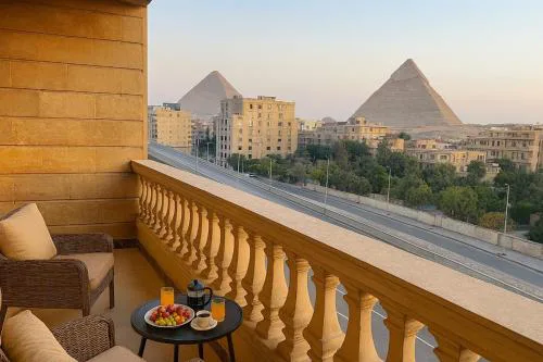 Two Icons One Balcony Pyramids and Grand Museum View