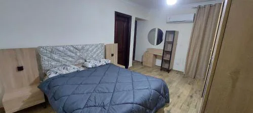 Fully finished 3-bedroom, 3-bathroom apartment with garden view in Jana Compound, Sheikh Zayed near Hyperone