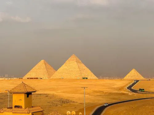 Wake Up to the Pyramids Rooftop Pharaohs Palace