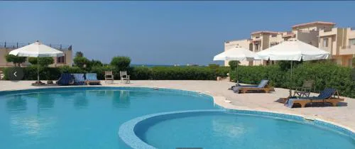 Beach and pools front challet in Ras Sudr families Only عائلات فقط