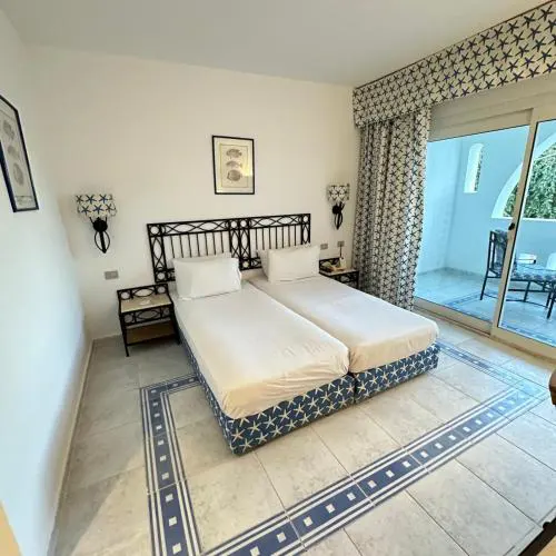 Suite privata al Domina club resort Acquamarine, Coral Bay, spa e casinó.