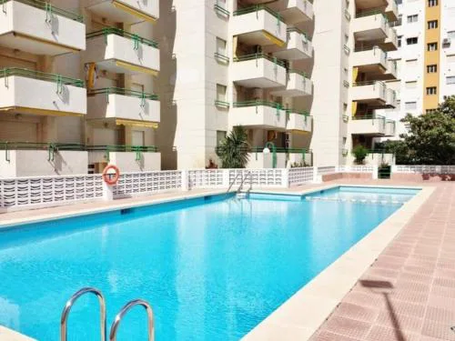 Apartamento en Gandía playa con piscina y garaje a 5min andando de la playa SOLO FAMILIAS o PAREJAS Numero de licencia turistica VT-48722-V