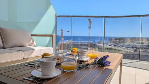 SUNSET WAVES azure apartment