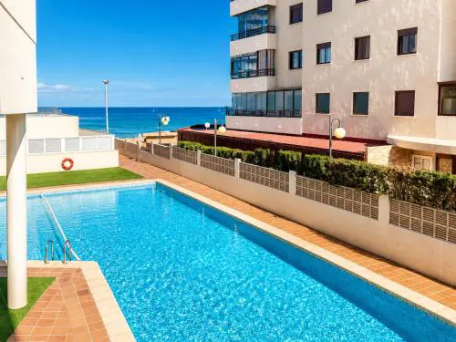 Apartment on the beach with parking and pool