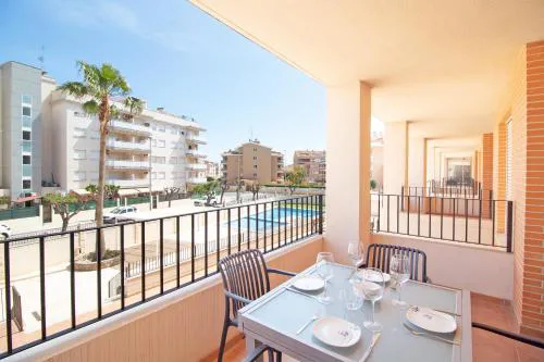 Global Vacacional, Apartamento con piscina y terraza en la playa de Canet