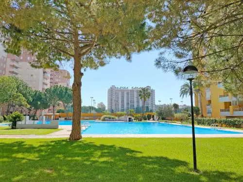 Global Vacacional, Practico apartamento con piscina en Residencial Brezo Canet
