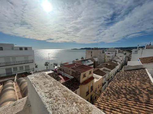 Duplex with spacious terraces and stunning sea views, right next to the beach
