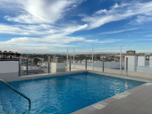 Apartment with rooftop pool 150 m from the beach