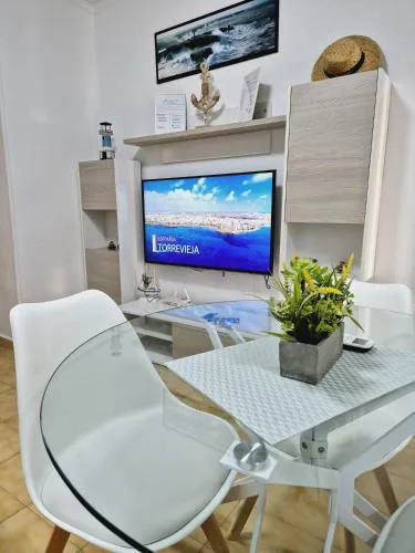 La Casa de Verónica - Serene Apartment with Shared Pool, Steps from the Beach