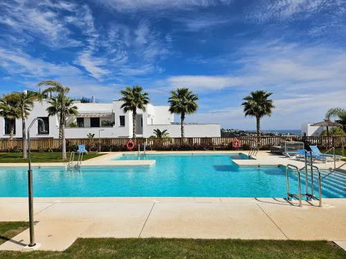Casa Banderas garden level pool front apartment