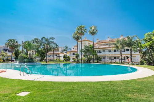 Apartment with terrace, pool and padel access REMS