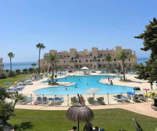La Cala gorgeous 2 bedroom apartment with stunning gardens, pools and sea views