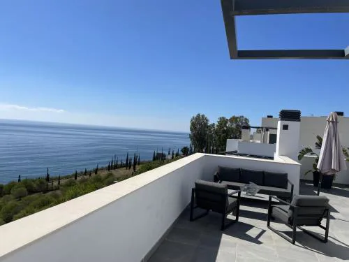 Sunny penthouse beach apartment with panoramic views