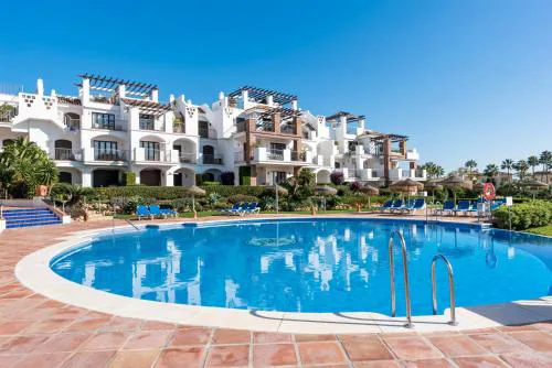 Sunny balcony with pool by Costarentals - Ref M52