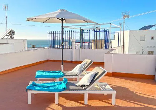 Sardinas apartment with roof terrace and sea view