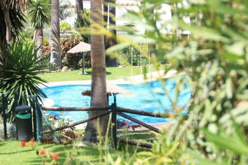Chalet adosado en urbanización con piscina