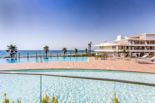 Front line beach apartment in The Edge with sea views