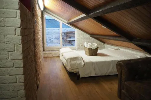 Tiny apartment on the roof touching Gibraltar