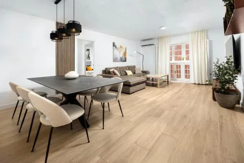 Central and Spacious Apartment with Parking on-site