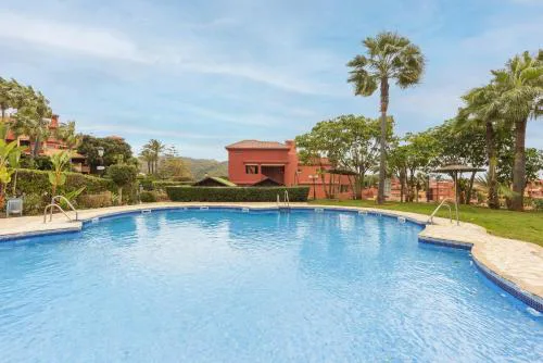 Stylish 2-Bed Apartment with Large Terrace & Pool