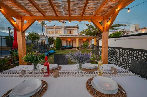 Typical beach house Las Chapas Playa with heated pool