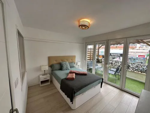 Central Apartment with Terrace & Seasonal Pool Walking Distance to the Beach by Namaste Elite
